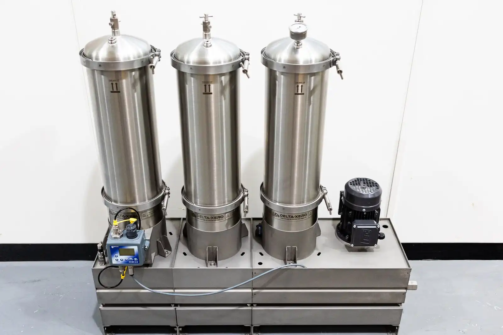 Three Delta Xero filter housings on a common tray