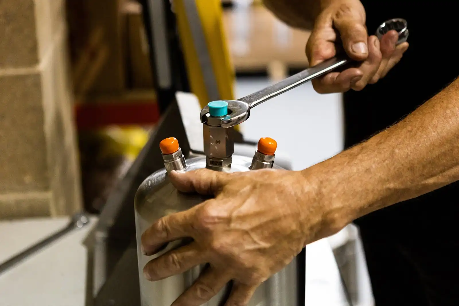 Hands assembling a Delta Xero filter housing